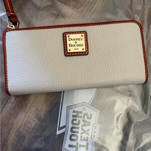 Dooney & Bourke Cream Leather Wristlet with Brown Trim and Gold Hardware